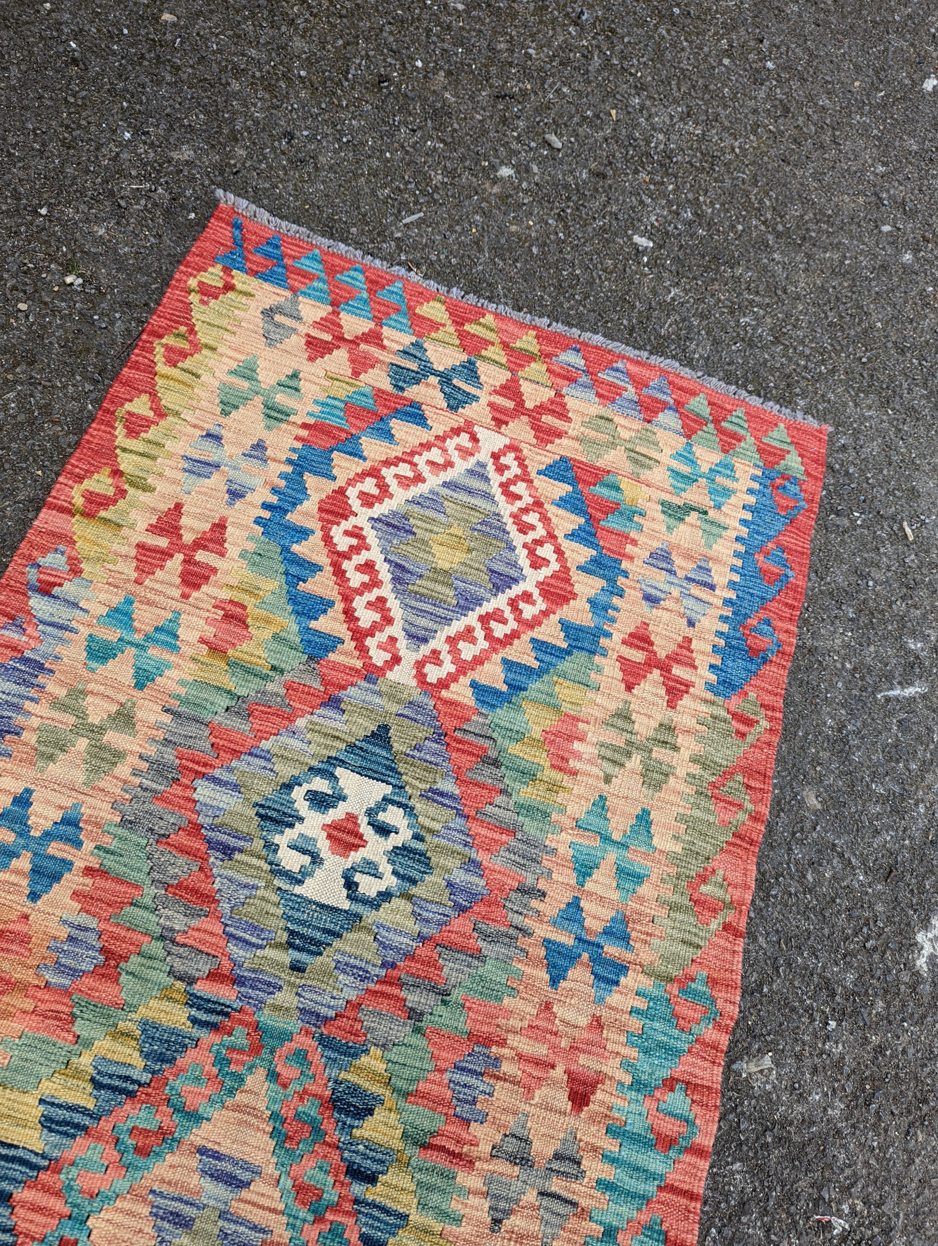 A contemporary Anatolian design Kilim flatweave runner, 290 x 85cm